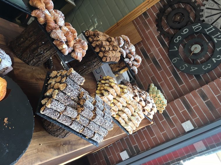 Traybake slices, caramel shortbread, chocolate tiffin and flapjacks, on the counter